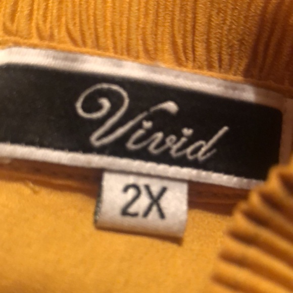 Woman’s Vivid long sleeve blouse with pearl key hole bell sleeves - Picture 13 of 13